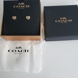 Coach heart earrings gold.